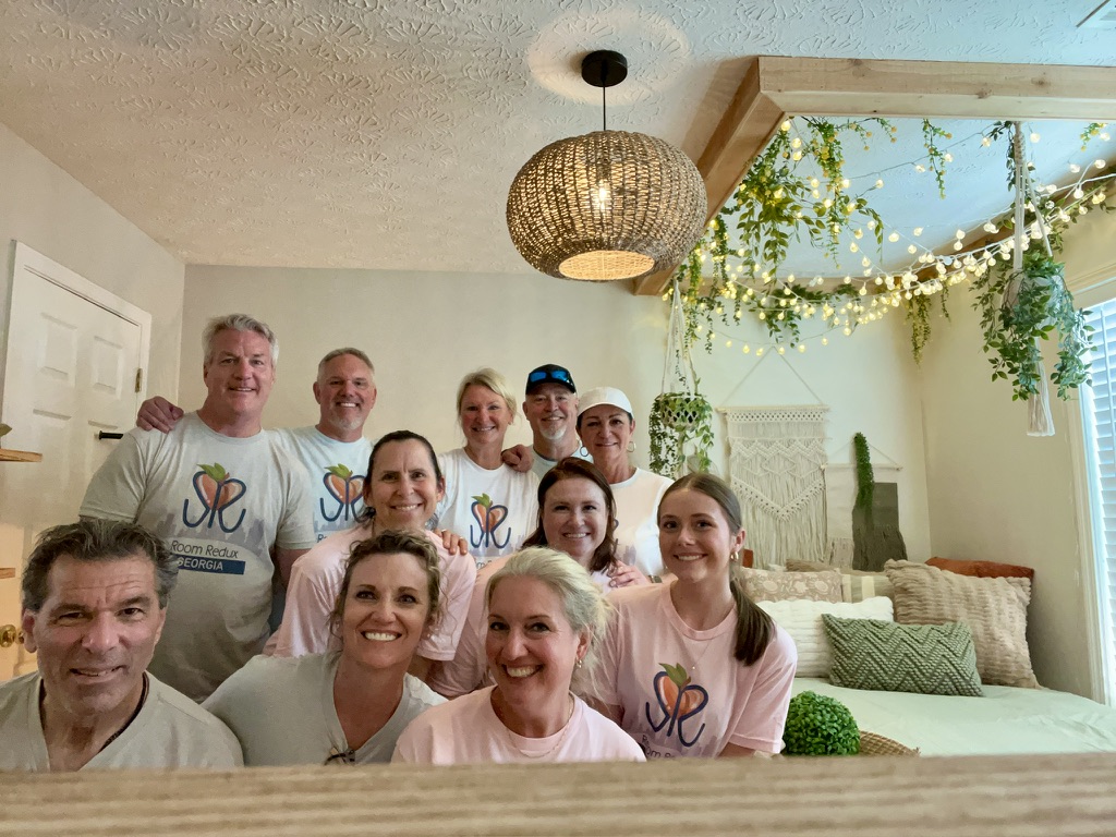 RRGA volunteer team gathered inside a completed room.